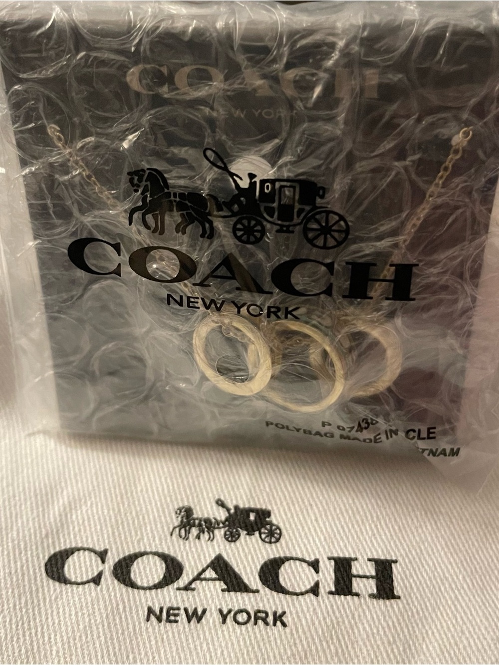 Coach Gold-Tone Pendant Necklace with Yellow and White Accents - Picture 4 of 4